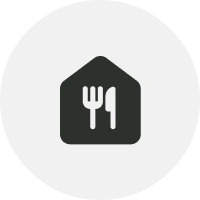 Icon of a house with a fork and knife in the center against a light background.